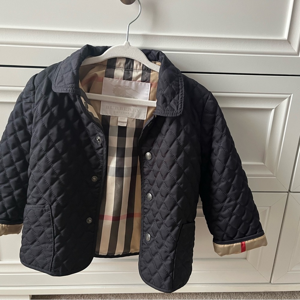 Burberry Black Puffer Jacket with Signature Style